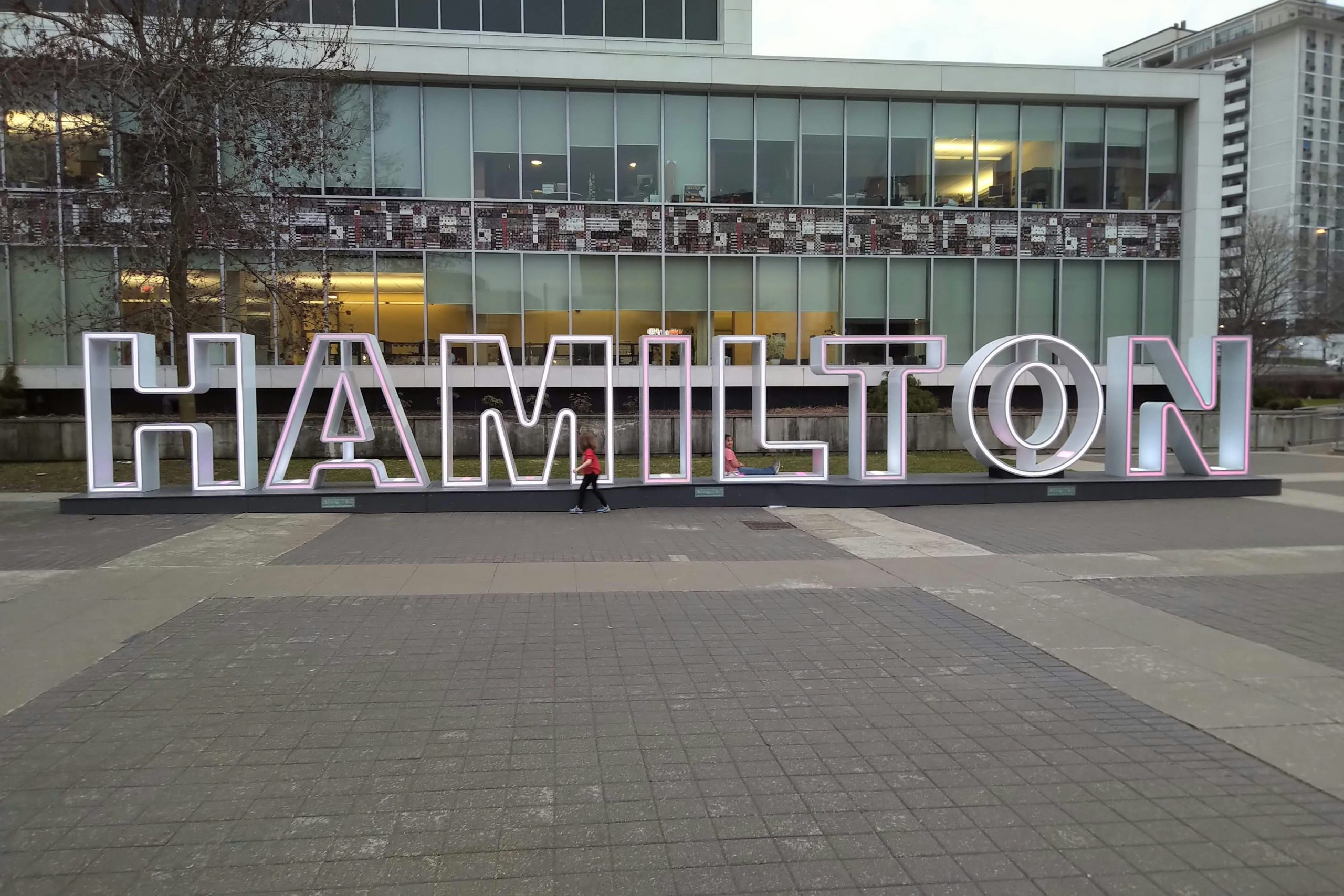 HAMILTON sign in front of City Hall, symbolizing civic leadership, integrity, and accountability in public service.